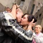 Pareja que escaló el Empire State se besa tras audiencia judicial